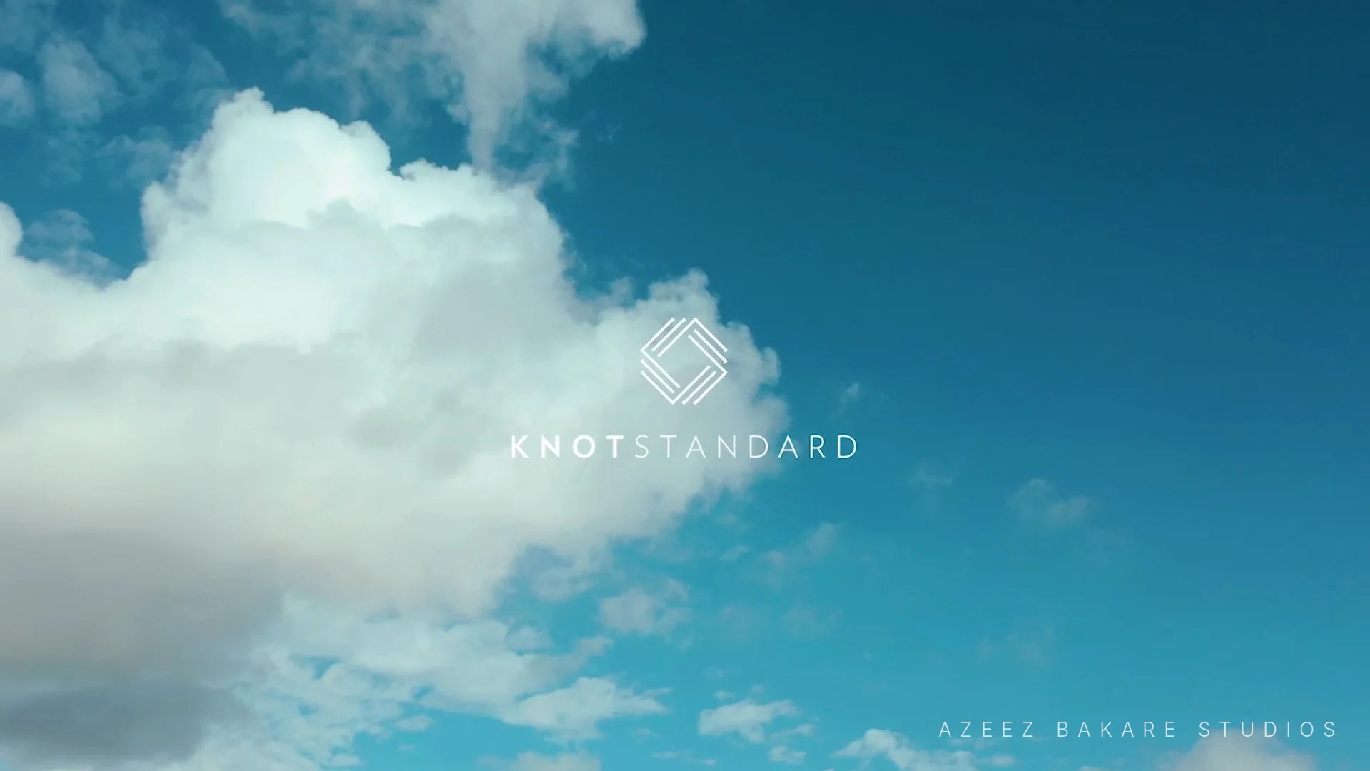 Knot Standard logo over open sky, still from the brand film, Miami